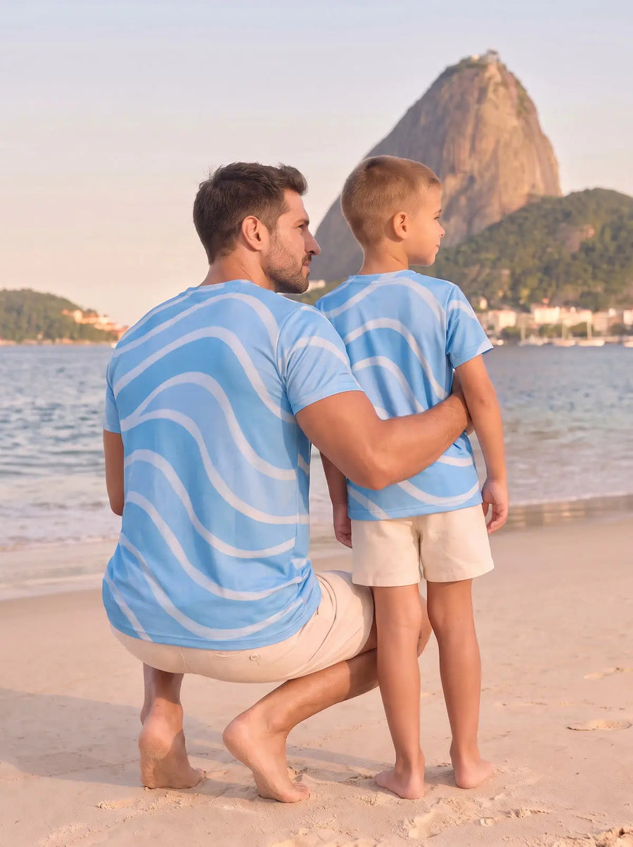 Man in a printed camp shirt and shorts