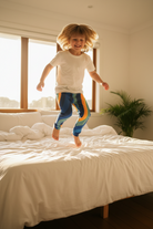 Boy jumping action shot