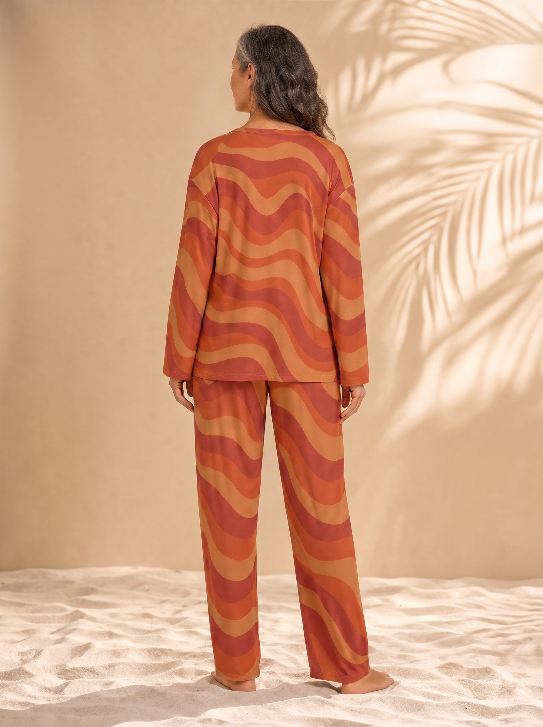 Copacabana long-sleeve pajama set in Laranja, back view on model