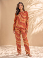 Copacabana long-sleeve pajama set in Laranja, front view on model